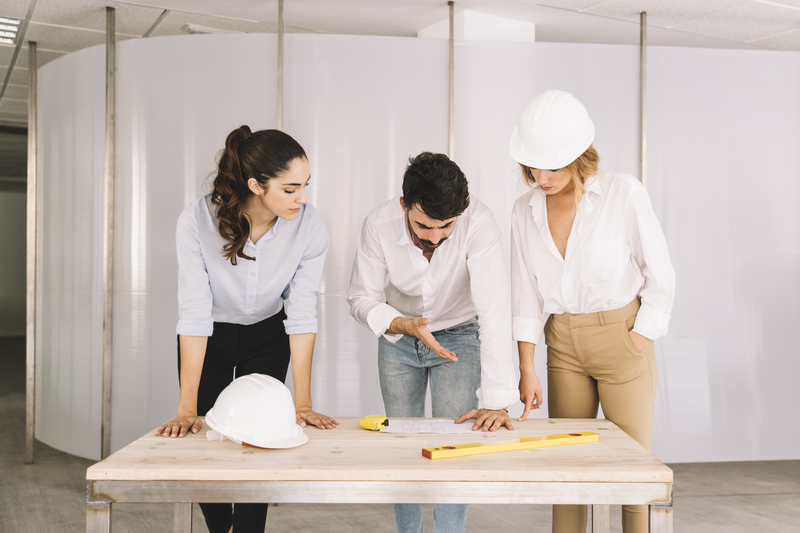 A group of people discussing a project plan