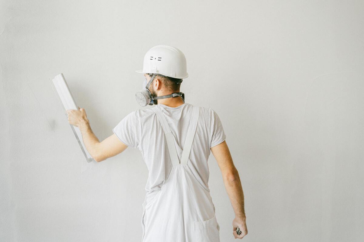 A worker finshing the commercial remodeling project