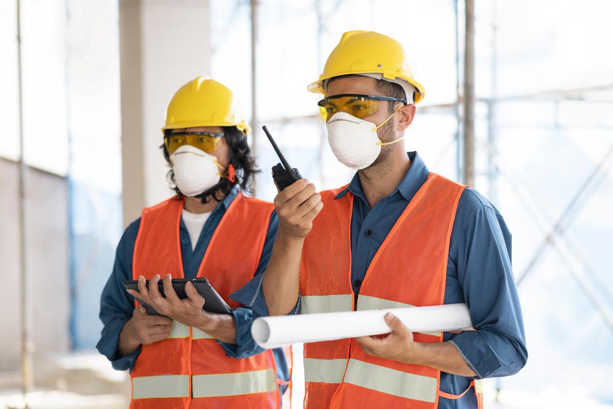 A worker finishing the commercial remodeling project.