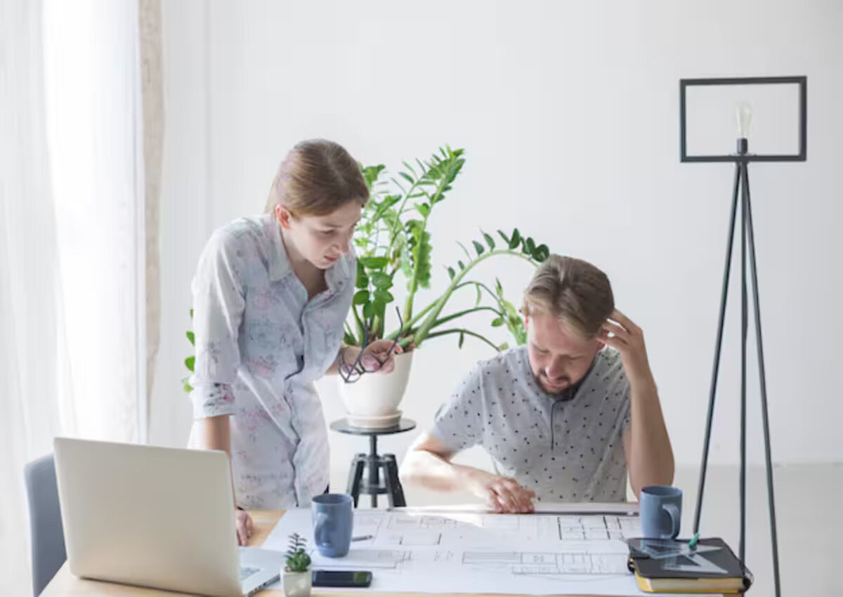 Architects and contractors discuss goals and estimates for commercial construction