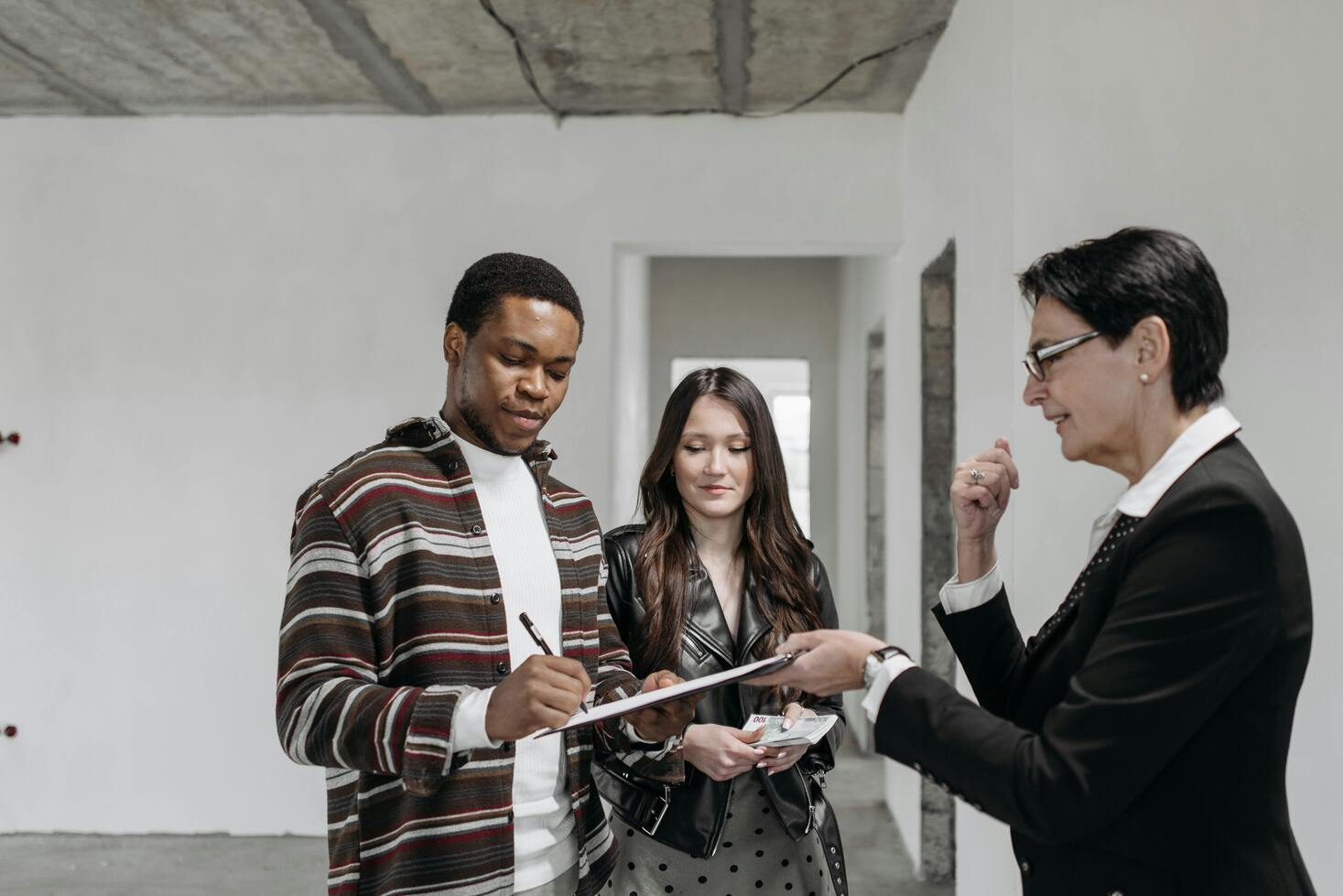 Signing a lease agreement with the landlord for a remodel
