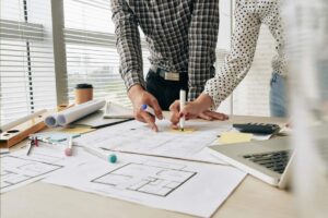an architect checking the design for building restaurants project