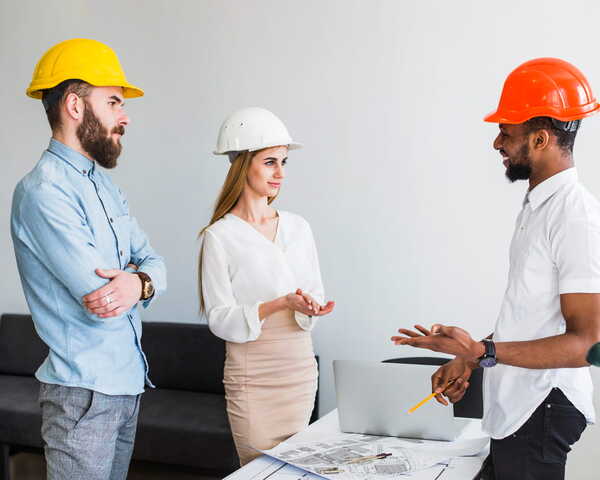 Restaurant owner talking to the construction engineer